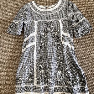 Free People checkered embroidered babydoll dress.